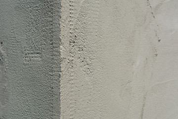 Facade plaster background. Cement plaster wallpaper