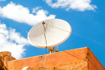 Satellite dish antenna on the roof.
