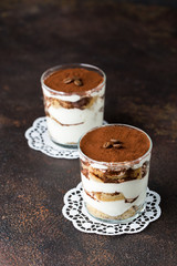 Italian dessert tiramisu in glasses