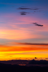 colorful dramatic sky with cloud at sunset.