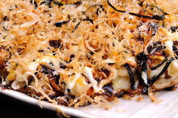 Okonomiyaki or Japanese pizza.