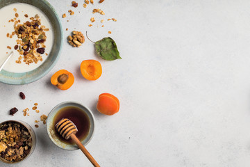 ealthy breakfast. Yogurt with granola and apricots