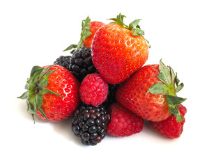 Fresh strawberry, raspberry and blackberry on wooden background, healthy food and diet.