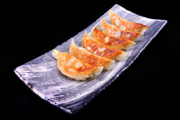 Japanese gyoza set to serve.