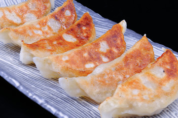 Japanese gyoza set to serve.