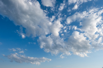 Fototapeta na wymiar White clouds in summer blue sky