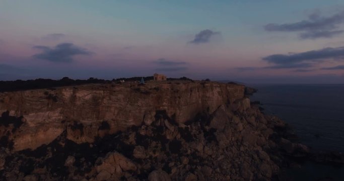 Aerial drone shot moving towards a Chapel of Immaculate Conception