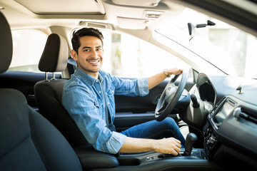 Handsome man in his car