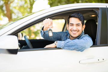 Man is his new car