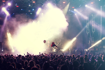 Fototapeta na wymiar Concert lights and crowd background 