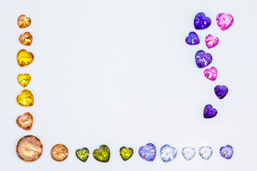amethyst diamonds in heart shape on the coner of white flame with copy space