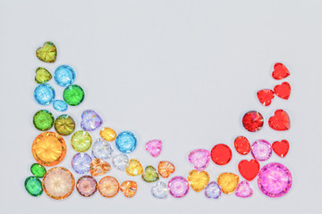 colorful diamonds in the coner of white flame with copy space