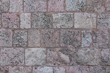 Old stone brick wall of St.Peter's church in Riga, Latvia