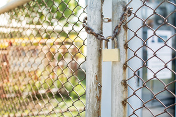 Close up on a lock gate and chain