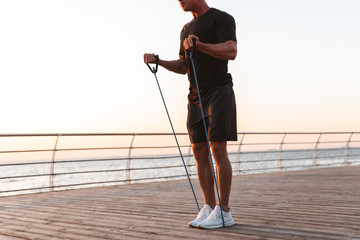 Cropped image of a fit sportsman doing exercises