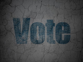Political concept: Blue Vote on grunge textured concrete wall background
