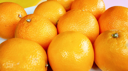 group of oranges on white plate