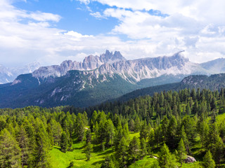 Aerial view Italian Dolomites. Sumer in Dolomiti Dolomites Mountains. Mountain forest in Dolomites. Croda Da Lago Ridge in Dolomites Mountains. Drone video in beautiful Italian Dolomites Mountains