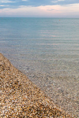 Beautiful summer sunset with clouds over the sea