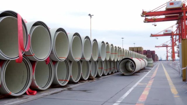 jacking pipes and containers in the port of Gdynia, harbor