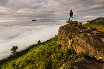 Obraz premium Photographer take a photo on high mountain in Phu-Luang, Loei province, Thailand.