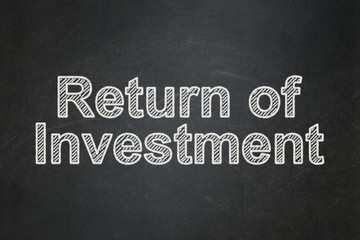 Obraz premium Business concept: text Return of Investment on Black chalkboard background