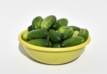 Cucumbers in a yellow plate