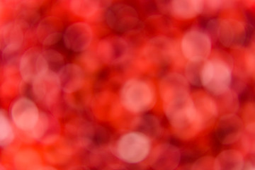 Abstract and defocused red backdrop. Blurred background