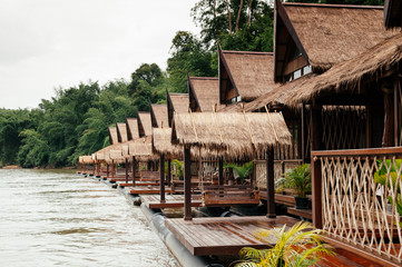 Wooden floating raft house in river Kwai at Sai Yok, Kanchanaburi, Thailand