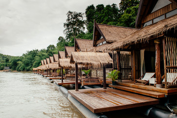 Wooden floating raft house in river Kwai at Sai Yok, Kanchanaburi, Thailand