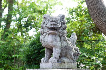 Fototapeta na wymiar Japanese stone lion statue in Nanba Yasaka Shrine .