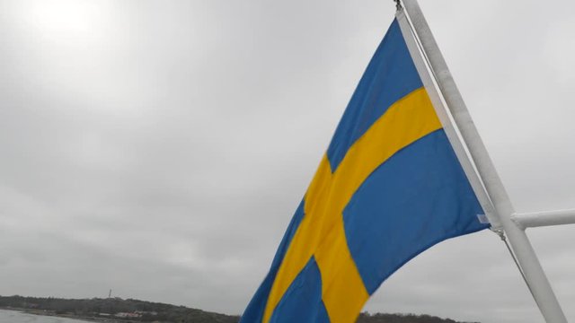 Swedish flag on boat.