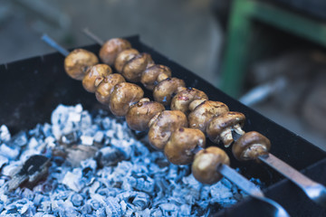 Fried mushrooms on the grill