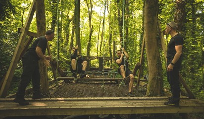 Fit mens training over obstacle course