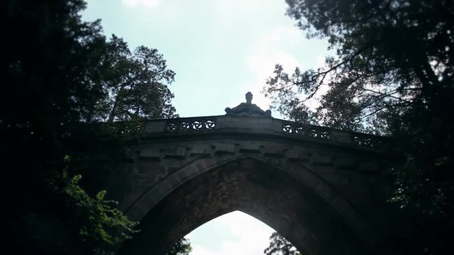 Old Stone Bridge At Laxenburg Castle In Austria Shot From The Moving Boat