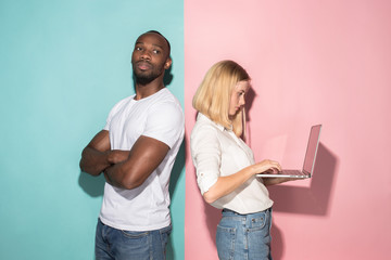 Businesswoman hugging laptop. Love to computer concept. Attractive female half-length front portrait