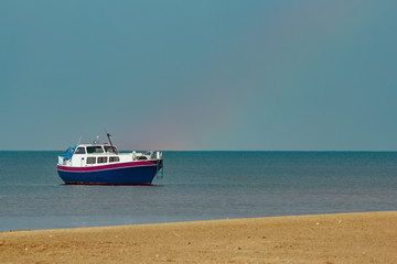 Small blue passenger ship