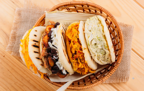 Combination of the typical South American Arepas in a woven basket