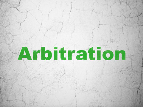 Law concept: Green Arbitration on textured concrete wall background