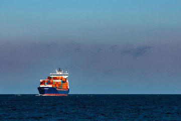 Fototapeta premium Blue container ship in Baltic sea