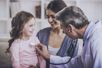 Doctor Examining Patient.