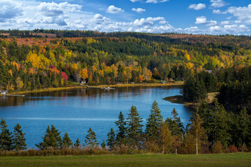 Fall foliage along a river in rural Prince Edward Island, Canada.