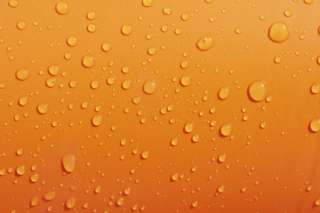 Water drops on orange