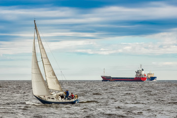 Blue sailboat at journey