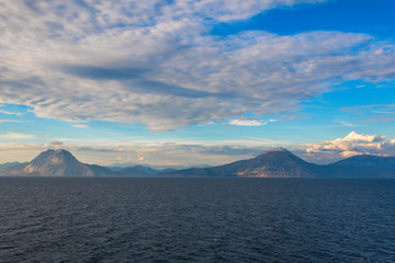 View of the Greek island of Makri from the ferry at sunset. Greek islands in the Ionian Sea