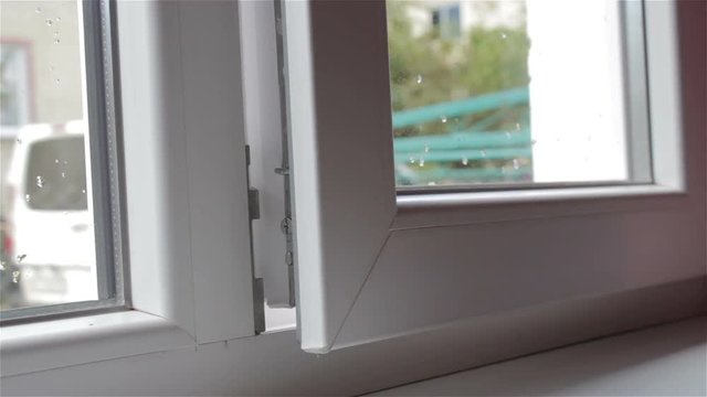 open window,the plastic window is opened up by the wind