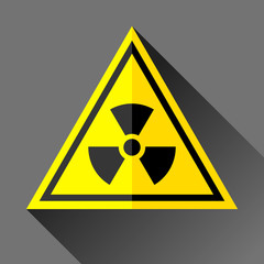 Fototapeta premium Radiation sign icon in flat style on gray background, toxic emblem in yellow triangle, vector design illustration for you project