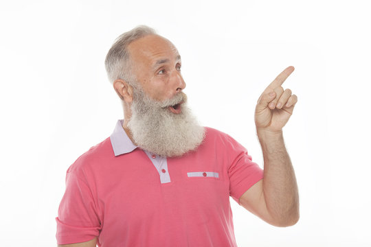 Handsome Smiling Bearded Man Pointing Away On White Background.