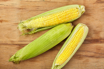 Fresh corn on wood desk