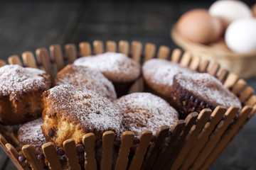 cupcakes in a wooden breadbasket